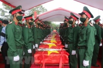 Remains of martyrs repatriated from Laos reburied in Nghe An, Thanh Hoa