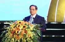 Prime Minister Pham Minh Chinh attended the Conference to honor people with meritorious services to the revolution